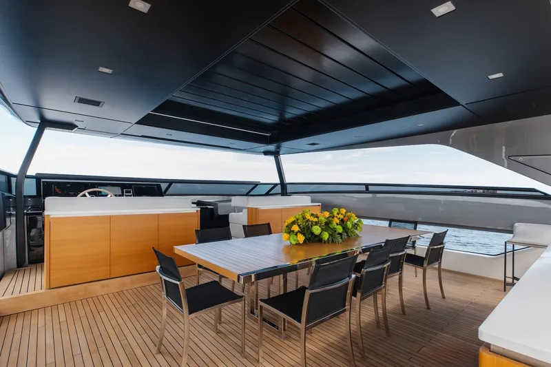 Slide: The Image of Luxurious Sanlorenzo SLA120A yacht deck with dining area, modern design, and ocean view, 2020 model. - 32