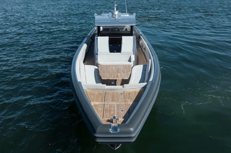 Slide: The Image of Novamarine BS 160 Outboard 2022 boat on water, featuring sleek design and spacious deck. - 20