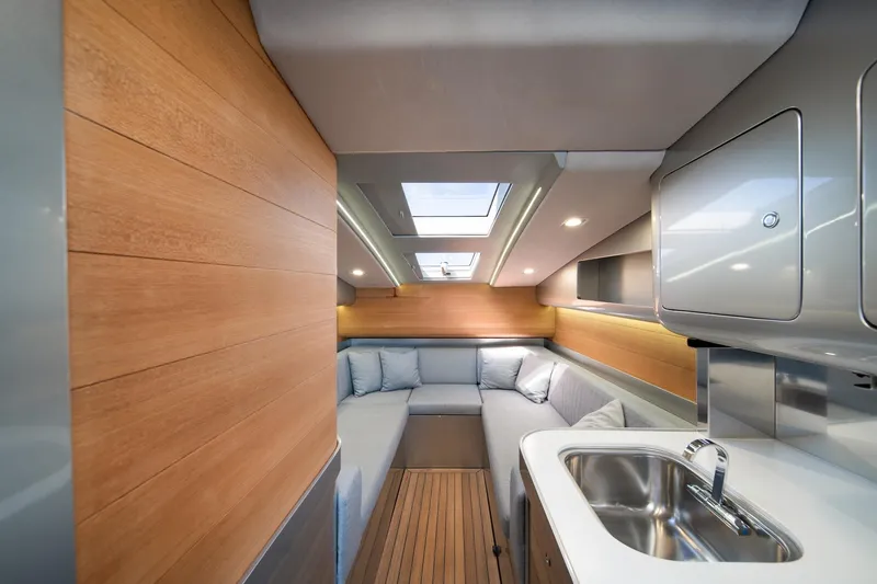 Slide: The Image of Luxurious interior of 2022 Novamarine BS 160 Outboard with modern kitchen and seating area. - 32