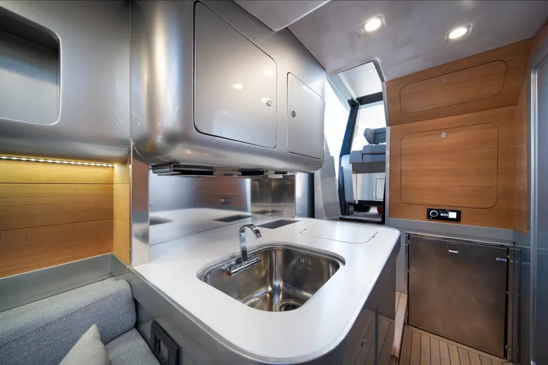 Slide: The Image of Modern interior of 2022 Novamarine BS 160 Outboard yacht with sleek kitchen design. - 34