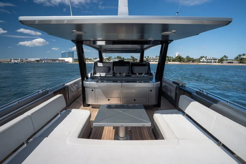 Slide: The Image of Novamarine BS 160 Outboard 2022 luxury yacht interior with seating and table on open water. - 36