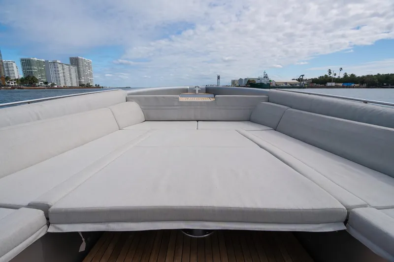 Slide: The Image of Luxurious seating area on 2022 Novamarine BS 160 Outboard boat, with cityscape in background. - 42