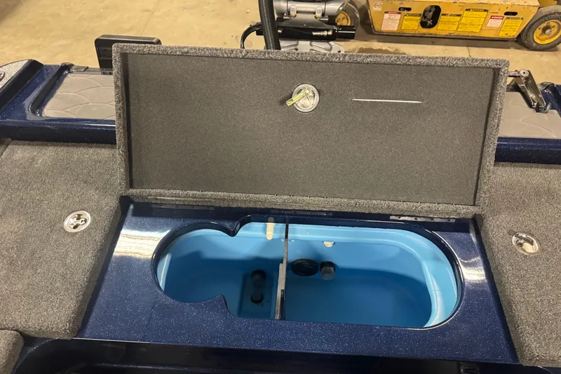 Slide: The Image of Open storage compartment on a 2026 Nitro ZV21 Pro boat, showcasing interior design. - 10