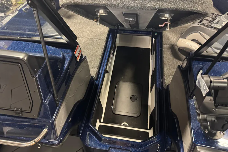 Slide: The Image of Interior view of a 2026 Nitro ZV21 Pro boat, showcasing storage compartment and seating. - 15