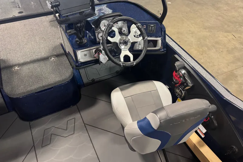 Slide: The Image of 2026 Nitro ZV21 Pro boat cockpit with steering wheel and seating. - 5