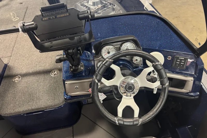 Slide: The Image of Steering console of 2026 Nitro ZV21 Pro boat with modern controls and gauges. - 6