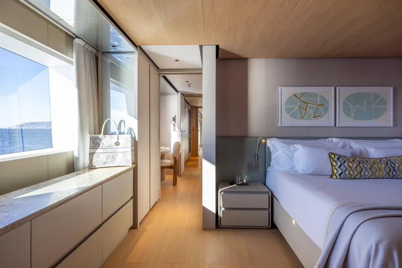 Slide: The Image of Luxurious interior of 2023 Cantiere Delle Marche RJ 115 yacht, featuring elegant bedroom and ocean view. - 18
