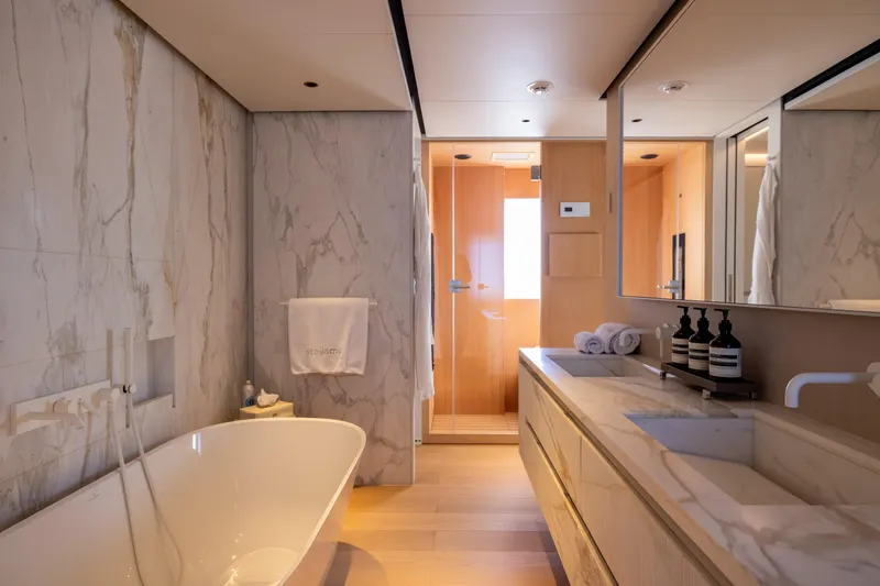 Slide: The Image of Luxurious bathroom in 2023 Cantiere Delle Marche RJ 115 yacht with marble finishes. - 19