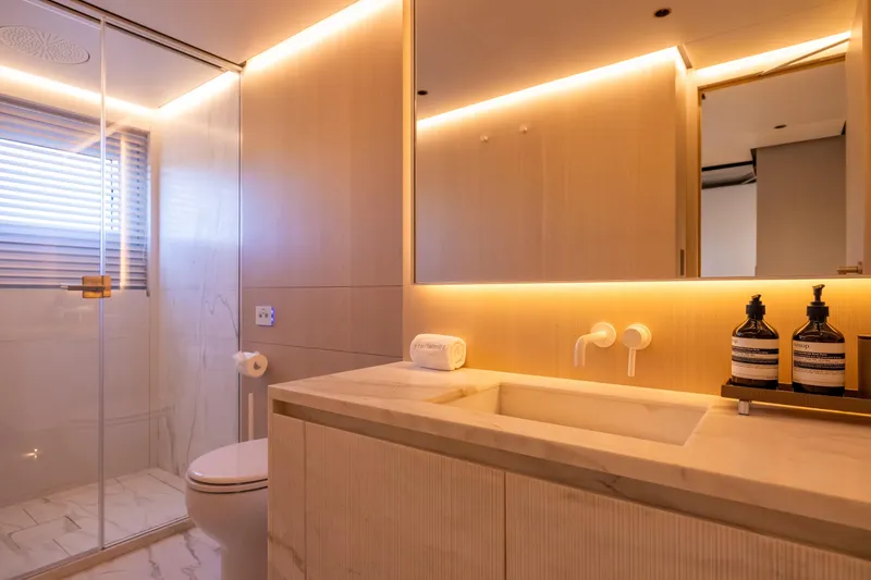 Slide: The Image of Luxurious bathroom on 2023 Cantiere Delle Marche RJ 115 yacht, featuring modern fixtures and ambient lighting. - 24