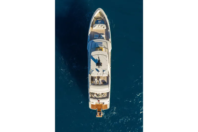 Slide: The Image of Aerial view of 2023 Cantiere Delle Marche RJ 115 yacht on blue ocean water. - 3