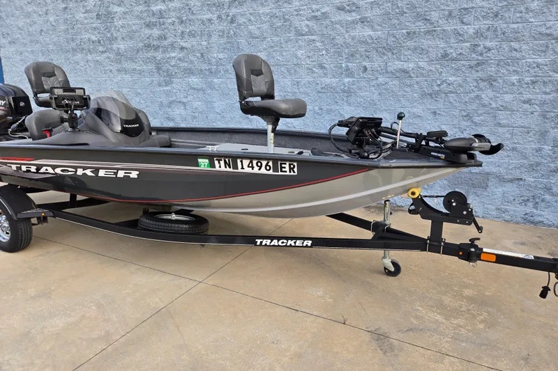 Slide: The Image of 2019 Tracker Pro Team 175 TF fishing boat on trailer, parked outdoors. - 59