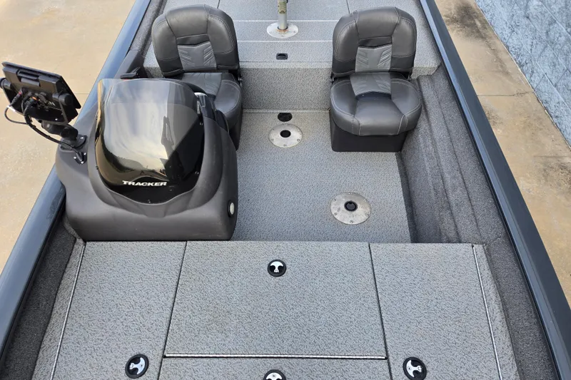 Slide: The Image of 2019 Tracker Pro Team 175 TF boat interior with seating and console. - 66
