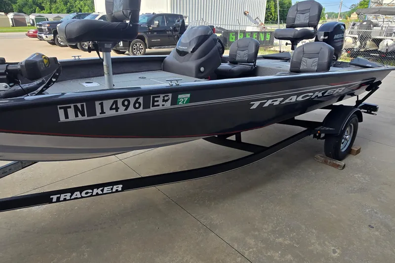 Slide: The Image of 2019 Tracker Pro Team 175 TF boat on trailer, parked outdoors. - 69