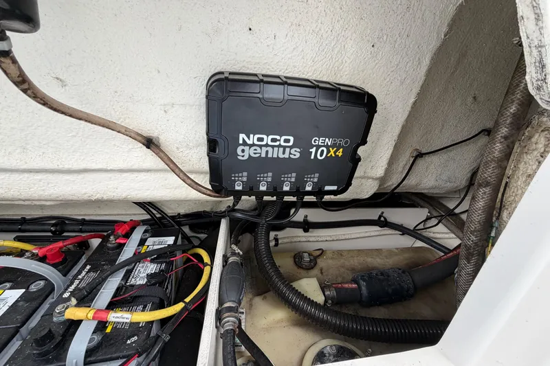 Slide: The Image of 2019 Robalo R272 Center Console boat with NOCO Genius GENPRO 10X4 battery charger. - 13