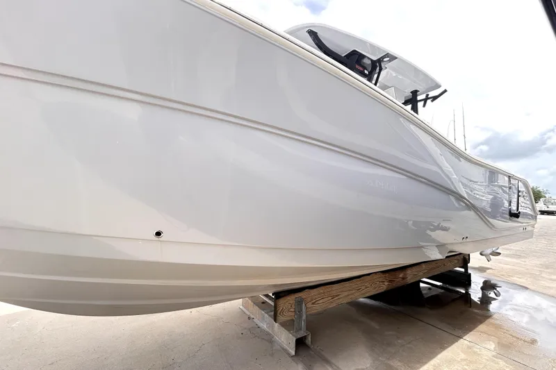 Slide: The Image of 2024 Sea Fox 328 Commander boat on display, showcasing sleek hull design. - 6