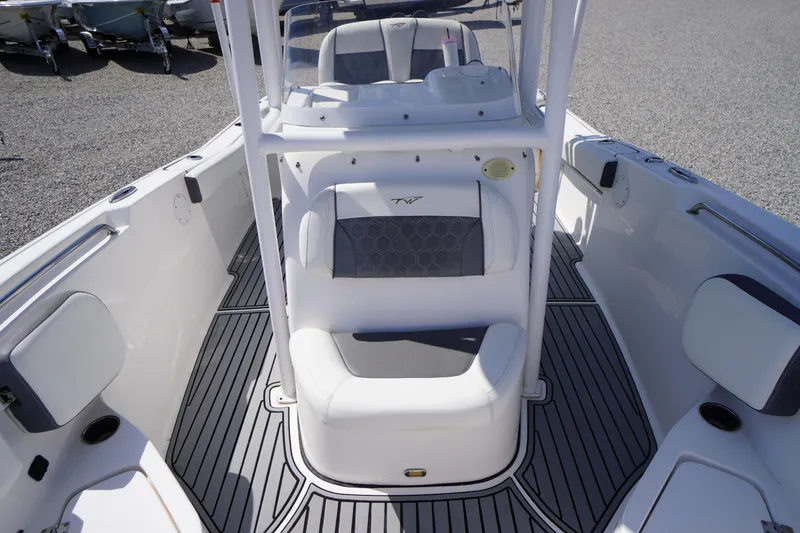 Slide: The Image of 2020 Tidewater 220 LXF boat interior with sleek seating and modern design. - 8