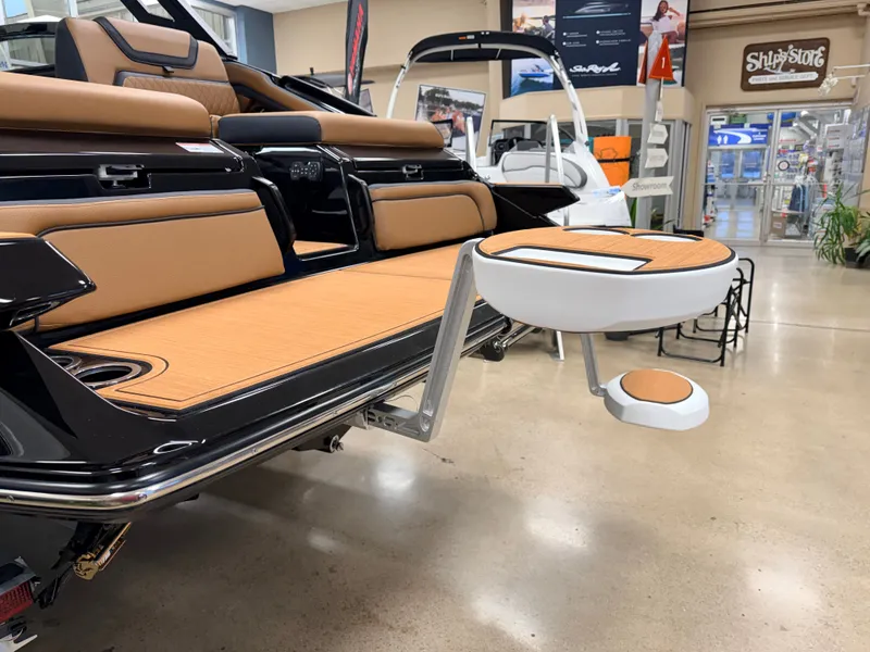Slide: The Image of Yamaha Boats 275 SD 2026 in showroom with stylish interior. - 12