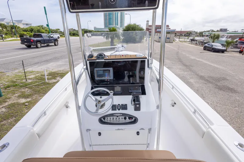Slide: The Image of 2004 Sea Craft 23 CC boat console with steering wheel and navigation equipment. - 20