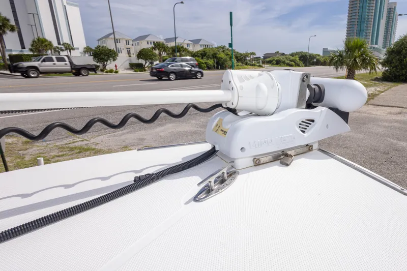 Slide: The Image of 2004 Sea Craft 23 CC boat with mounted trolling motor on deck. - 28