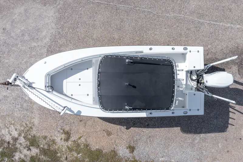Slide: The Image of Aerial view of 2004 Sea Craft 23 CC boat on gravel surface. - 6