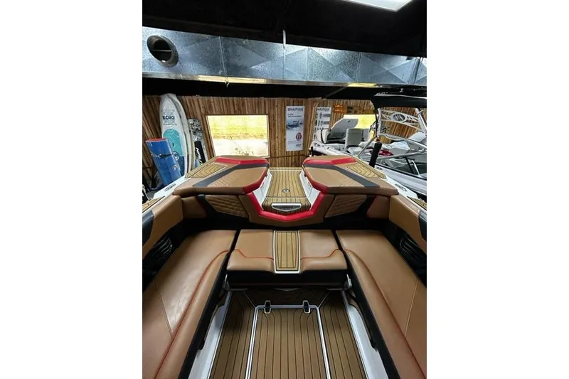 Slide: The Image of 2023 Nautique Super Air Nautique G23 interior with luxurious seating and stylish design. - 6
