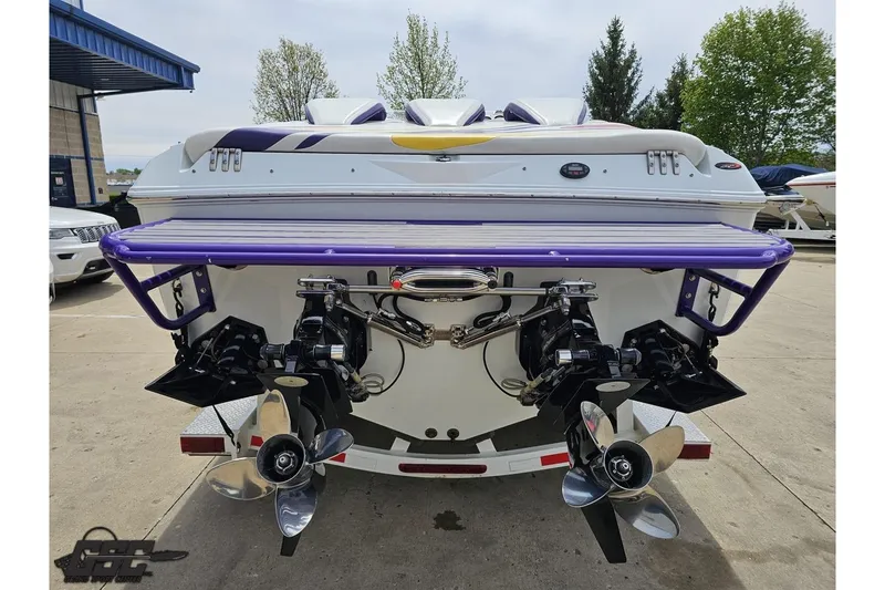 Slide: The Image of Rear view of a 2005 Baja 30 Outlaw boat with dual propellers. - 29