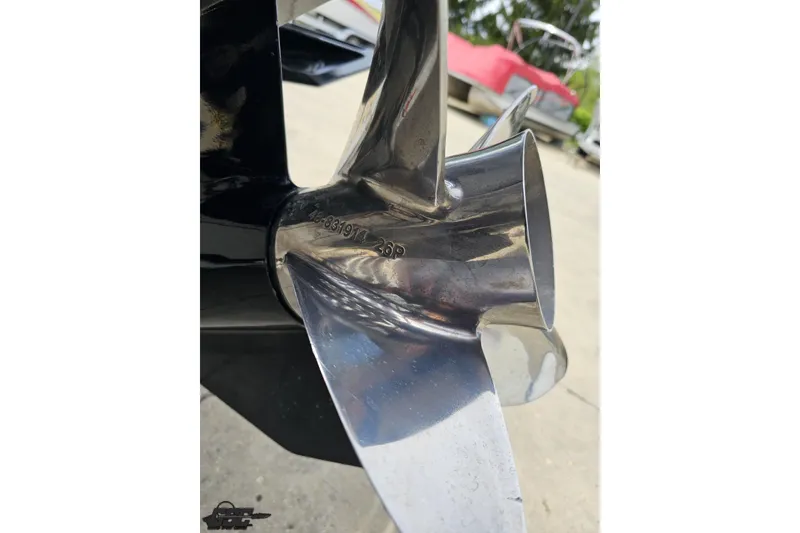 Slide: The Image of Close-up of a polished propeller on a 2005 Baja 30 Outlaw boat. - 33