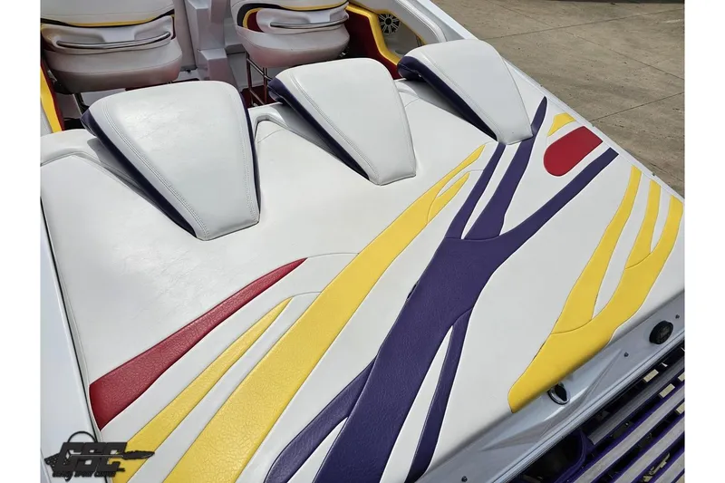 Slide: The Image of 2005 Baja 30 Outlaw boat interior with colorful seat design. - 36