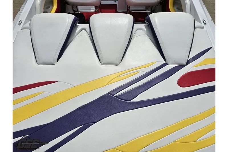 Slide: The Image of 2005 Baja 30 Outlaw boat interior with colorful upholstery design. - 39
