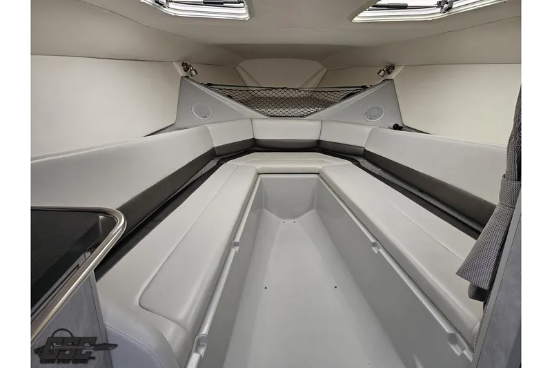 Slide: The Image of Interior of a 2005 Baja 30 Outlaw boat with sleek seating and modern design. - 67