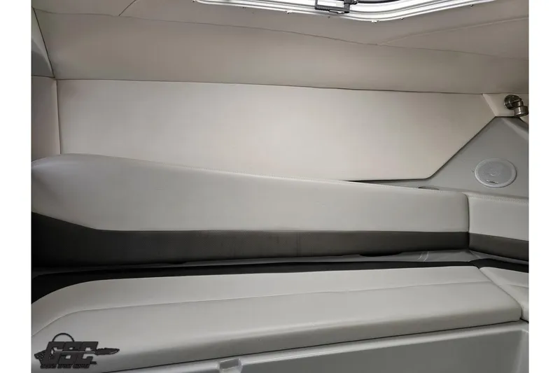 Slide: The Image of Interior cabin of a 2005 Baja 30 Outlaw boat, featuring sleek, modern seating. - 71