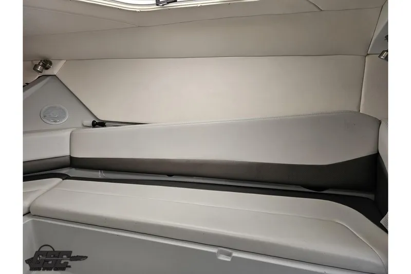 Slide: The Image of Interior of a 2005 Baja 30 Outlaw boat, featuring sleek, modern seating. - 73