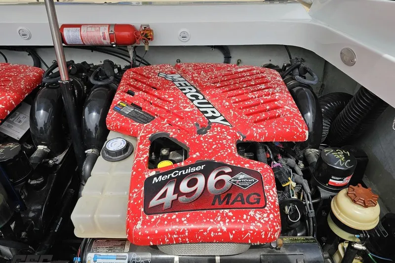 Slide: The Image of Engine compartment of a 2005 Baja 30 Outlaw with MerCruiser 496 MAG engine. - 89