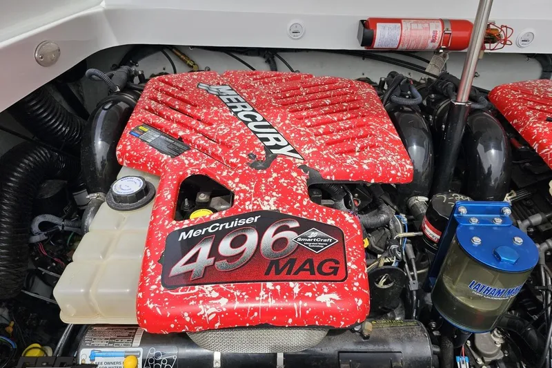 Slide: The Image of Engine compartment of a 2005 Baja 30 Outlaw with MerCruiser 496 MAG engine. - 90