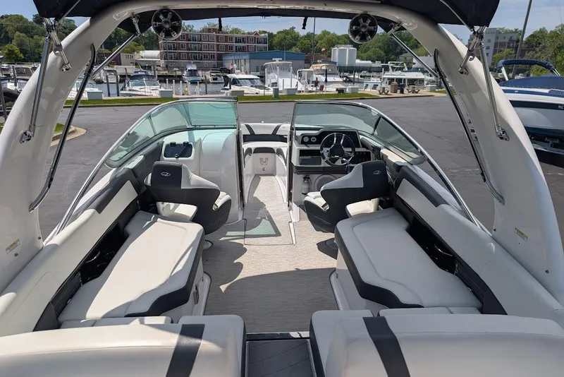 Slide: The Image of 2017 Regal 2500 Bowrider interior with luxurious seating and modern dashboard at marina. - 11
