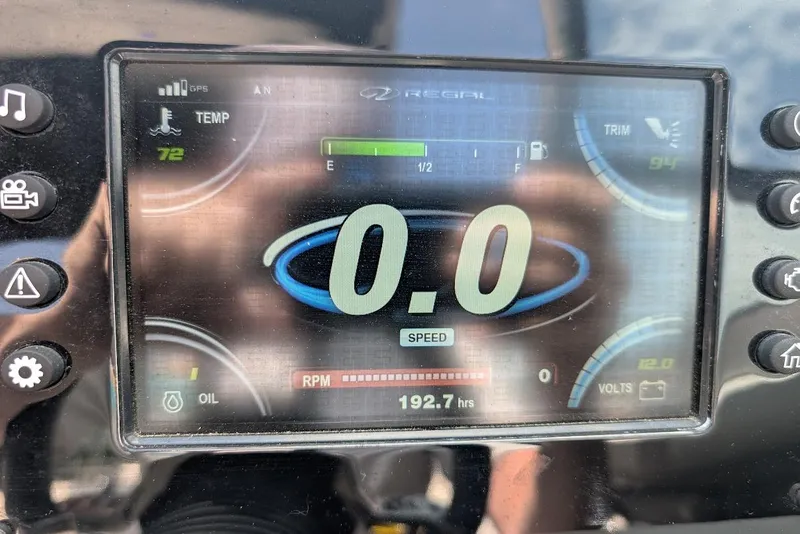 Slide: The Image of Dashboard display of a 2017 Regal 2500 Bowrider showing speed, temperature, and fuel levels. - 17