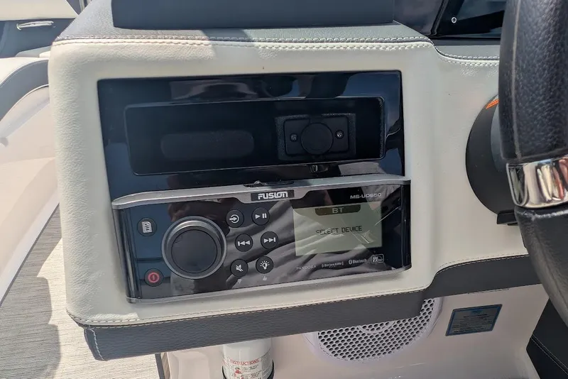 Slide: The Image of Fusion stereo system on 2017 Regal 2500 Bowrider boat dashboard. - 19