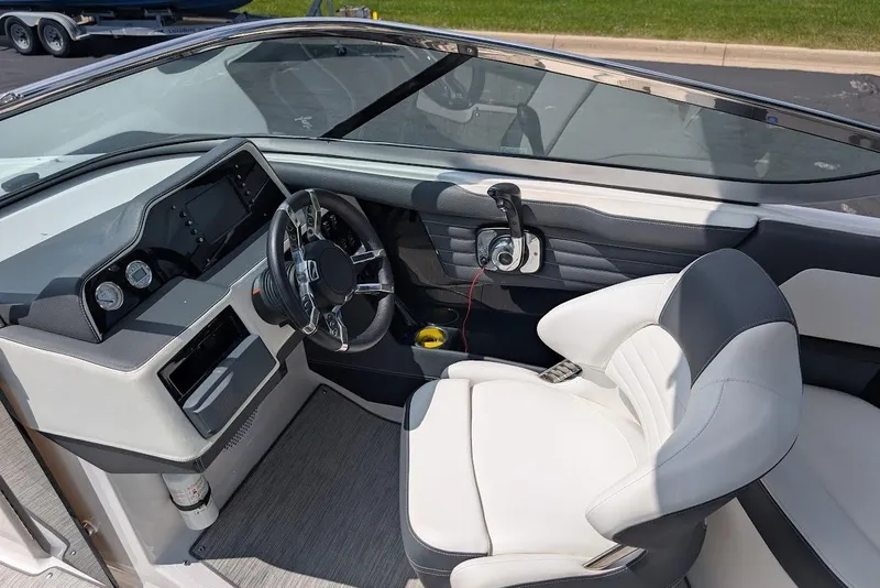 Slide: The Image of 2017 Regal 2500 Bowrider cockpit with modern steering and controls. - 20