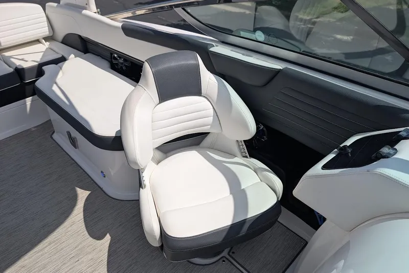 Slide: The Image of Interior of 2017 Regal 2500 Bowrider boat with white and black seating. - 21