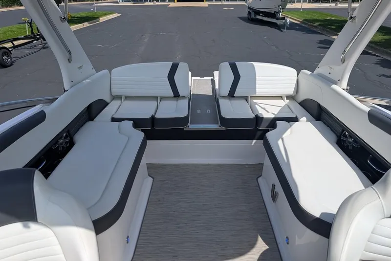 Slide: The Image of 2017 Regal 2500 Bowrider interior with white seating and spacious layout. - 33