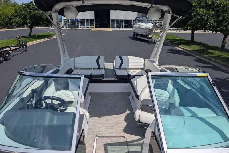 Slide: The Image of 2017 Regal 2500 Bowrider boat with sleek interior and dual seating arrangement. - 36
