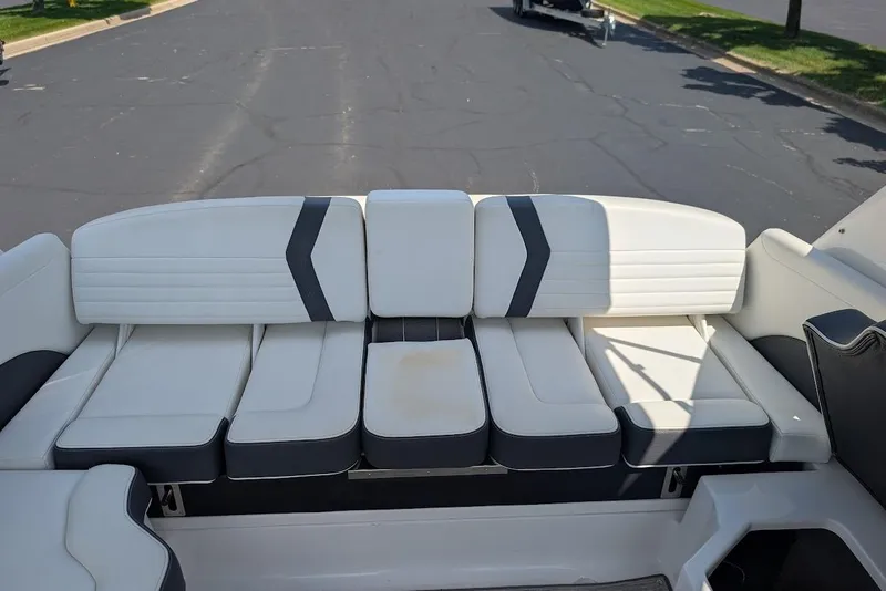 Slide: The Image of 2017 Regal 2500 Bowrider boat interior with white cushioned seating. - 37