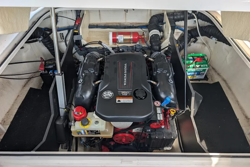 Slide: The Image of Engine compartment of a 2017 Regal 2500 Bowrider boat, featuring a Volvo Penta engine. - 40
