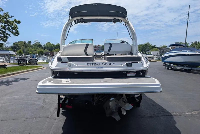 Slide: The Image of 2017 Regal 2500 Bowrider boat at marina, rear view with swim platform. - 7
