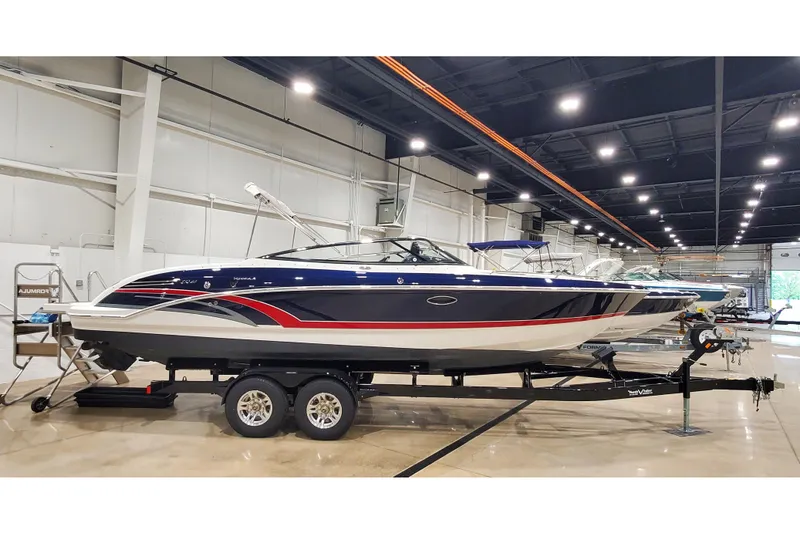 The Image of 2018 Formula 270 Sun Sport boat on trailer in showroom. - 1