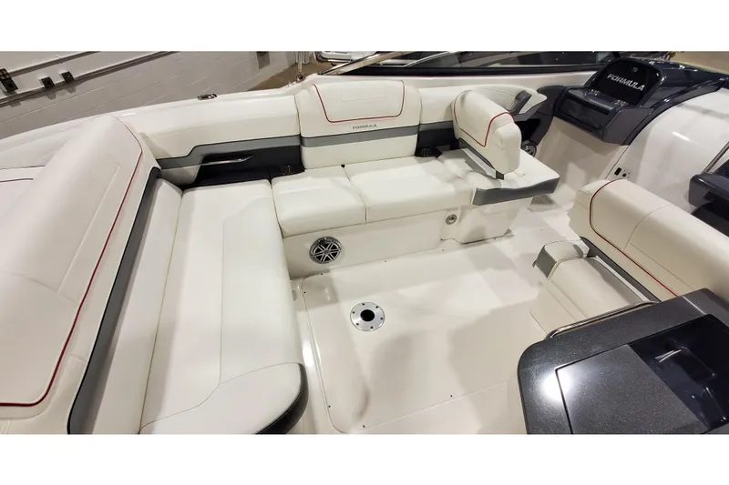 Slide: The Image of 2018 Formula 270 Sun Sport boat interior with white seating and modern design. - 11