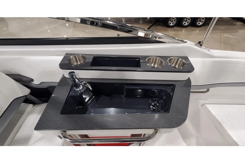 Slide: The Image of 2018 Formula 270 Sun Sport boat interior with sink and cup holders. - 13