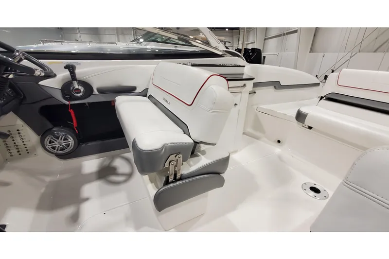 Slide: The Image of 2018 Formula 270 Sun Sport boat interior with white and gray seating. - 19
