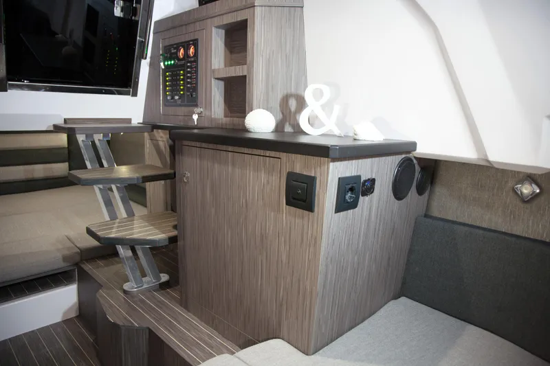 Slide: The Image of Interior of 2025 Ranieri CAYMAN 35.0 EXECUTIVE yacht with modern design and wooden finishes. - 12