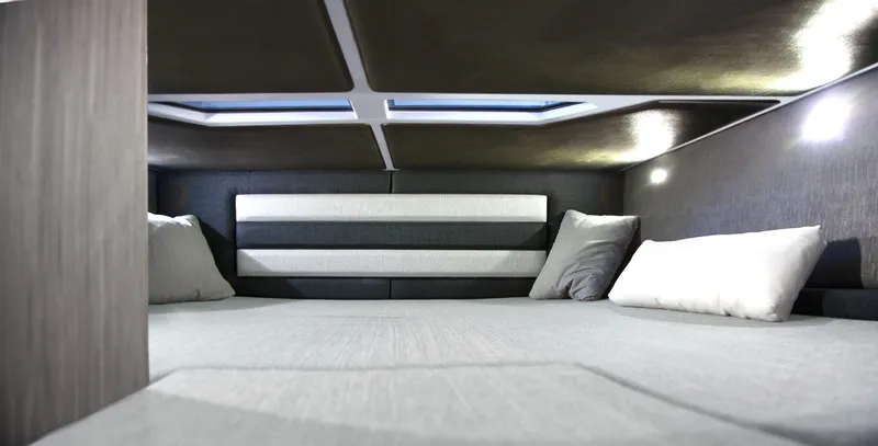 Slide: The Image of Interior cabin of 2025 Ranieri CAYMAN 35.0 EXECUTIVE with modern bedding and skylights. - 15